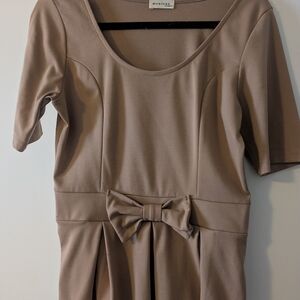 Peplum Top With Bow Detail